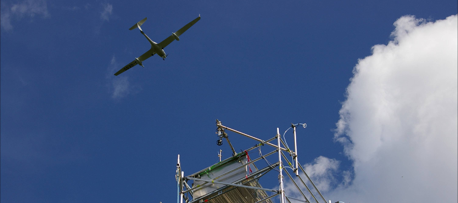 image of aircraft overflying fluyx tower